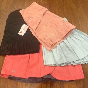 Assorted Athletic Skirts - Lot of 4. 3 new and 1 gently worn. All size XL (14)
